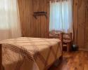 The relaxing bedroom of the cabin.